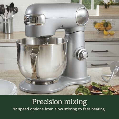 Silver stand mixer on kitchen counter with precision mixing text.